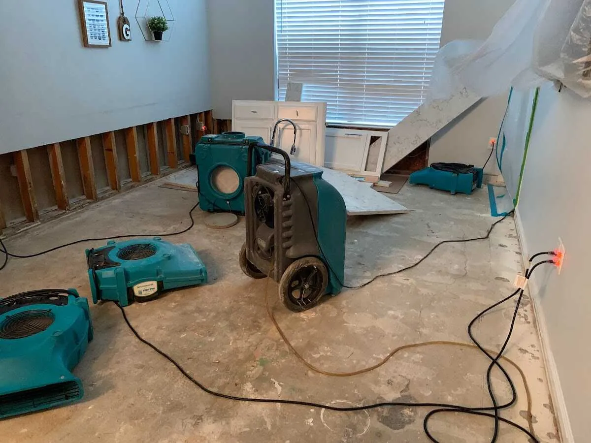 Dehumidifier in flood-cut room for Water Damage Restoration in Pacific